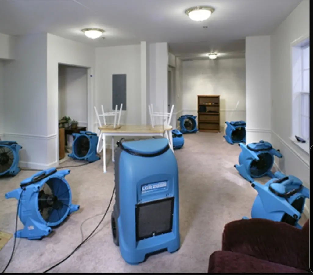 Air movers and dehumidifier setup for Water Damage Restoration in Safford